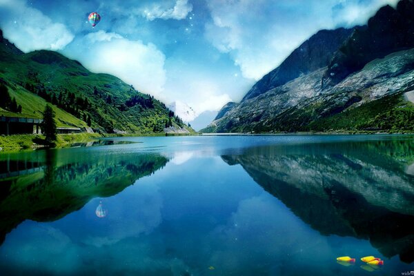 Las montañas se reflejan en el agua azul del lago