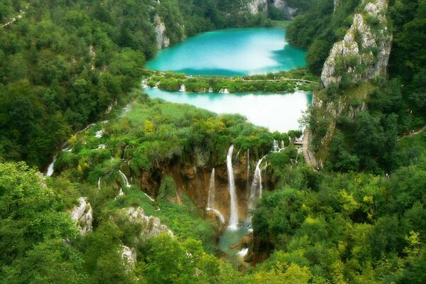 Mountain, blue lake with a waterfall