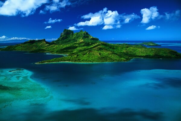 Green island in the blue ocean