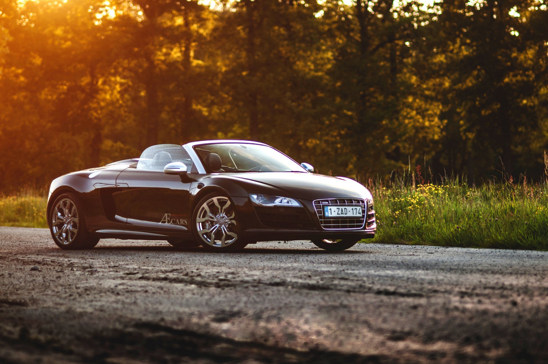 audi r8 v10 spyder schwarz vorne sonne