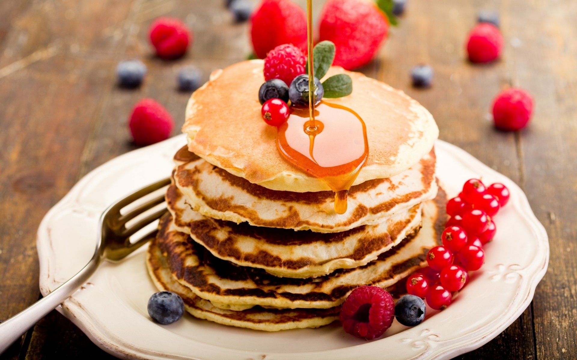 raspberry blueberries pancakes currants berries food plate honey