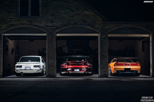 Three cars nissan skyline, rbg porsche, acura nsx