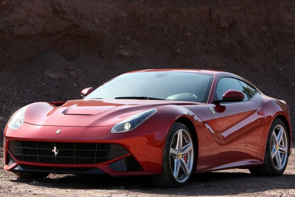 Beautiful red mirrored Ferrari in the afternoon