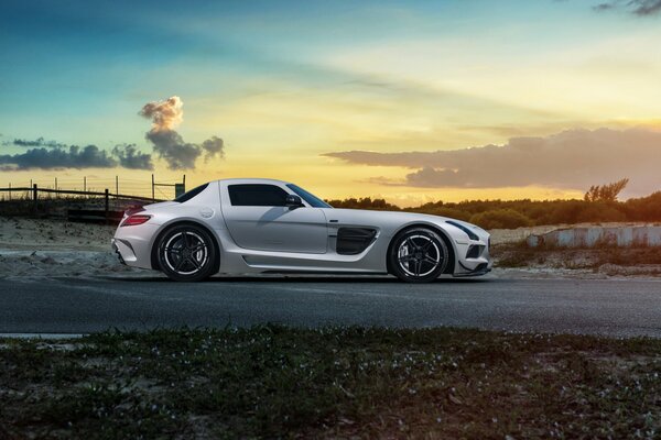 White Mercedes roadster on a beautiful background