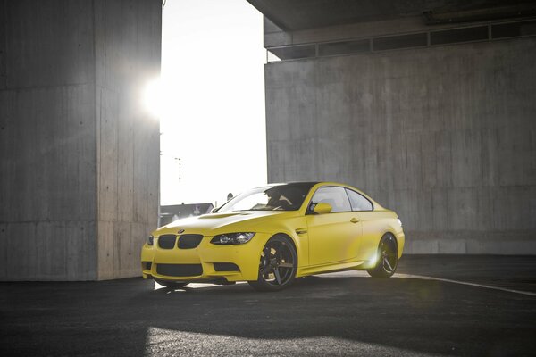 Black rims on a yellow bmw dream car