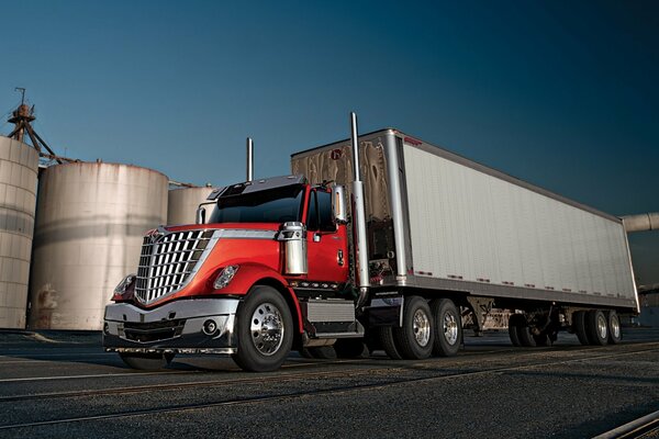 International transport truck on the sky background