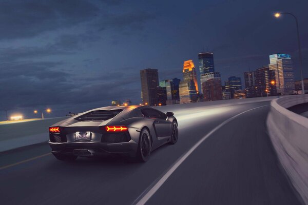 Art with lamborghini aventador lp700-4 on the background of a night city