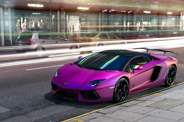 Purple Lamborghini parked on the road