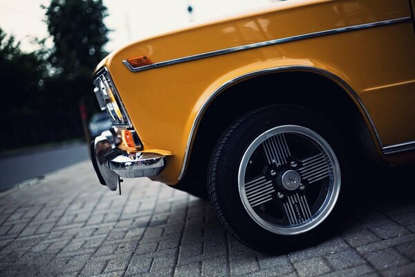 Yellow Lada car on tuning