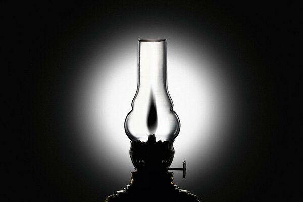 Black and white photo of a kerosene lamp