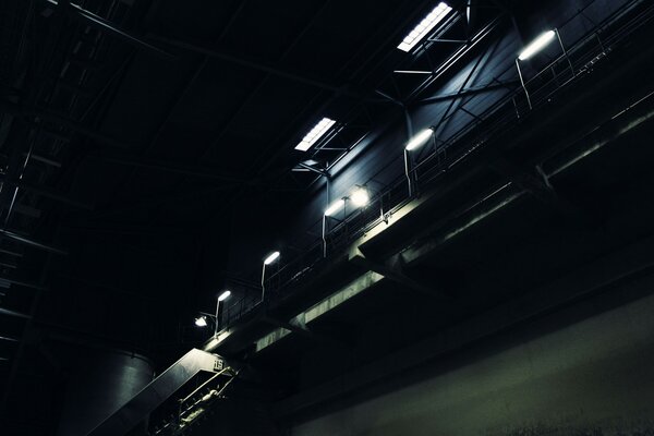 Stairs of an empty factory, photo in the dark