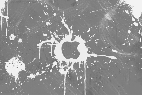 An apple in white paint on a gray background