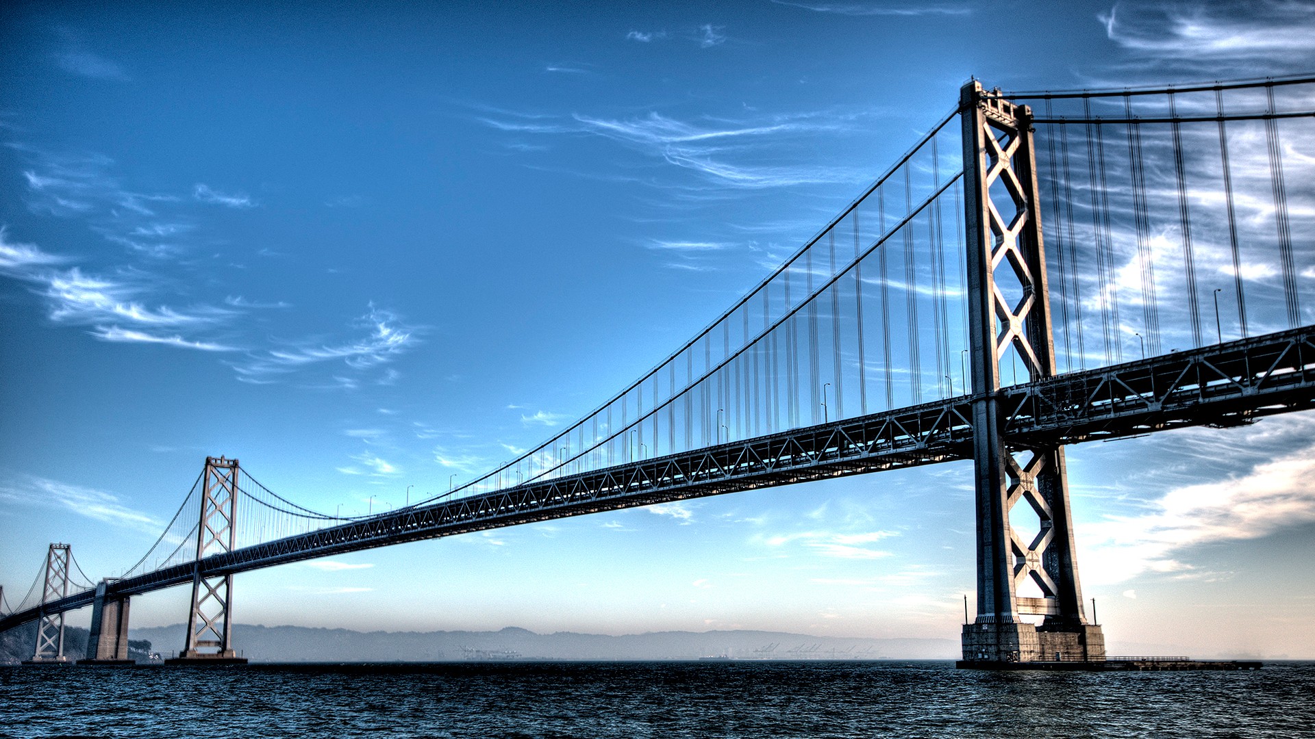 bridge water mountain sky