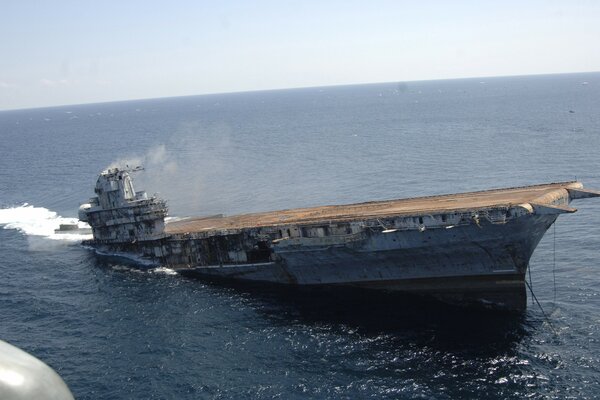 Destruction of a large ship at sea