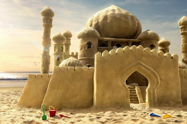 Sand castle on the seashore