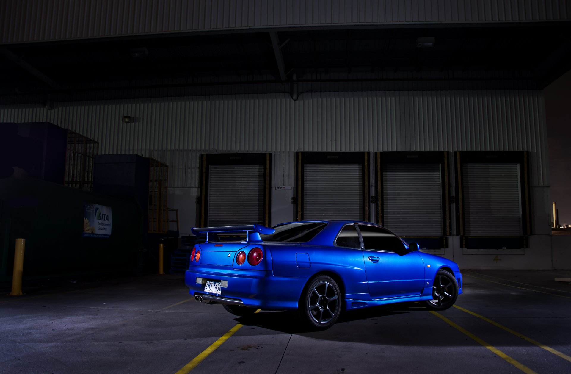 nissan skyline r34 nissan skyline blau rückseite flügel schatten