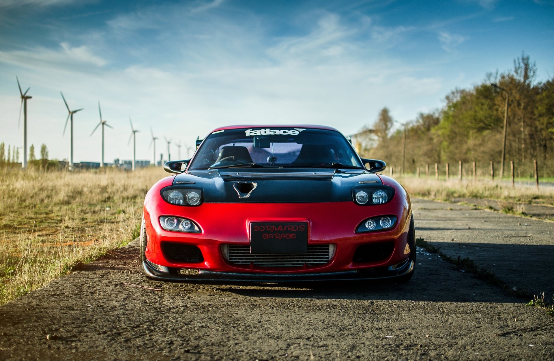 mazda rx-7 rot mazda rot front himmel wolken windkraftanlagen