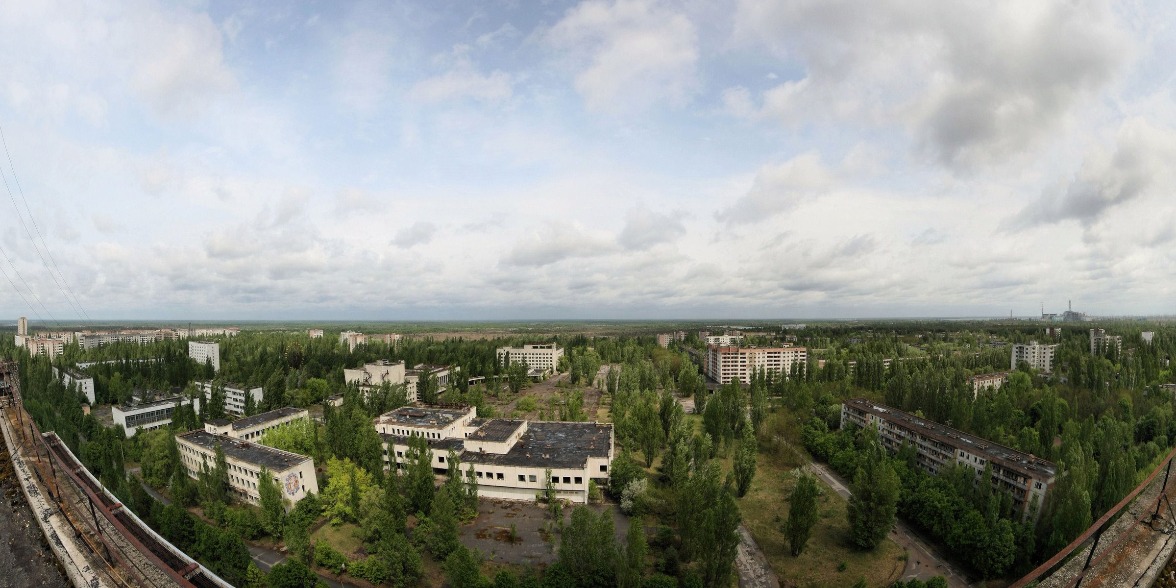 pripyat a ghost town the sky trees roof apartment