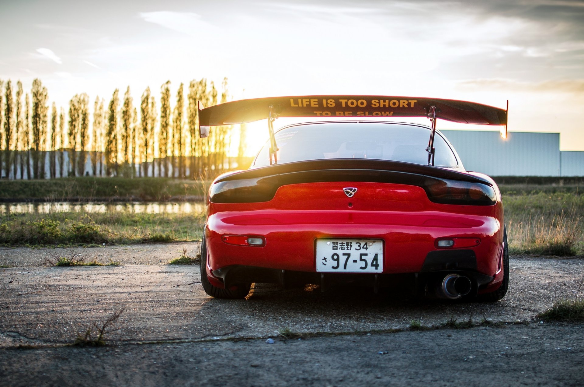 mazda rx-7 rosso mazda rosso coda ala tramonto