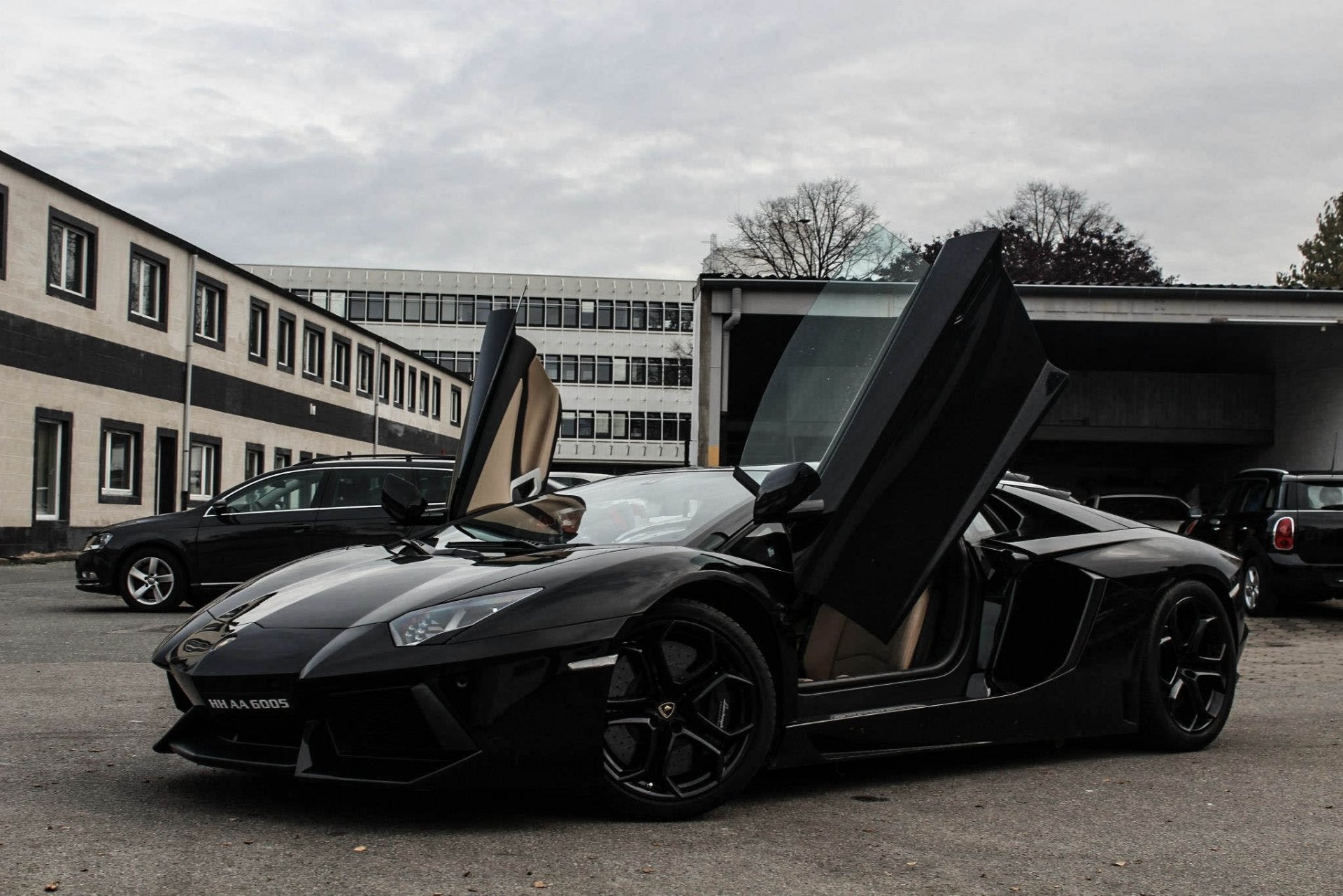 lamborghini aventador lp700-4 black lamborghini aventador side view doors guillotine buildings sky cloud