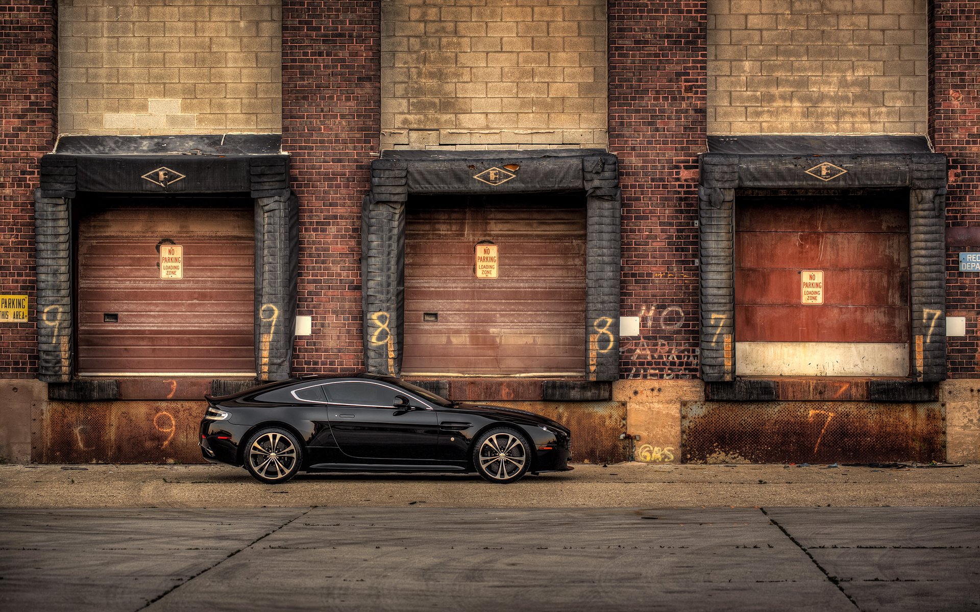 aston martin v12 vantage carbon edition side view