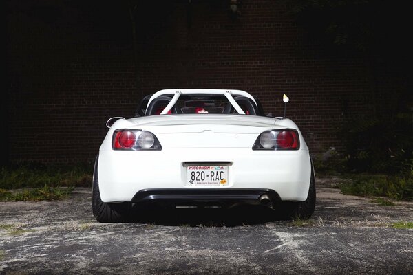 White Honda s200. Rear view. Picture on wallpaper