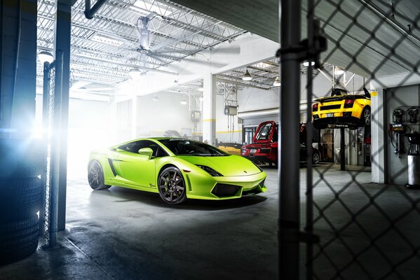 Green lamborghini gallardo in the garage