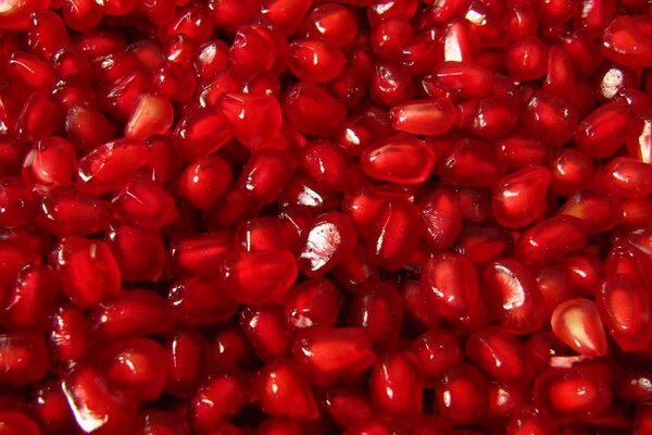 Pomegranate pulp. Ripe fruit. Pomegranate pulp near