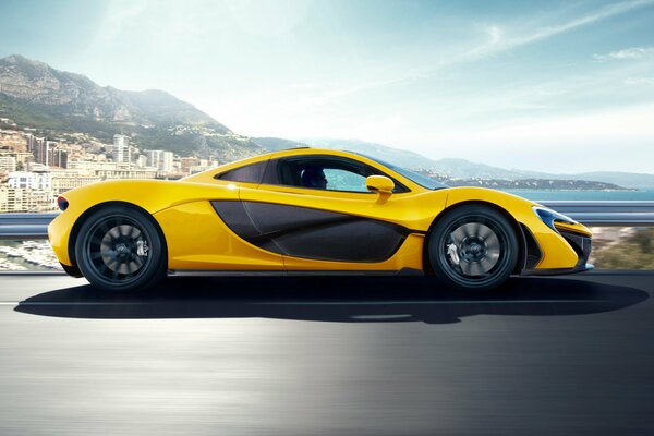 Black and yellow mclaren, side view