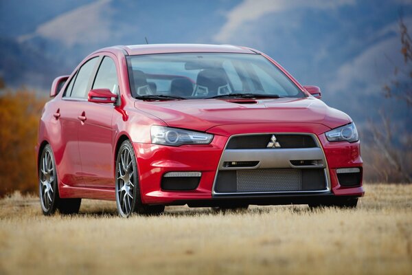 Rouge vif mitsubishi evo x