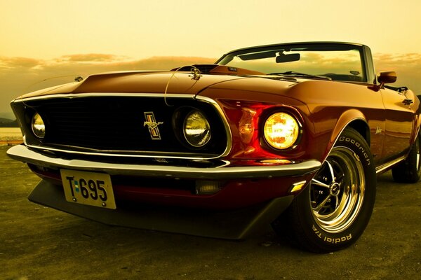 Ford Mustang convertible 1969. Evening road