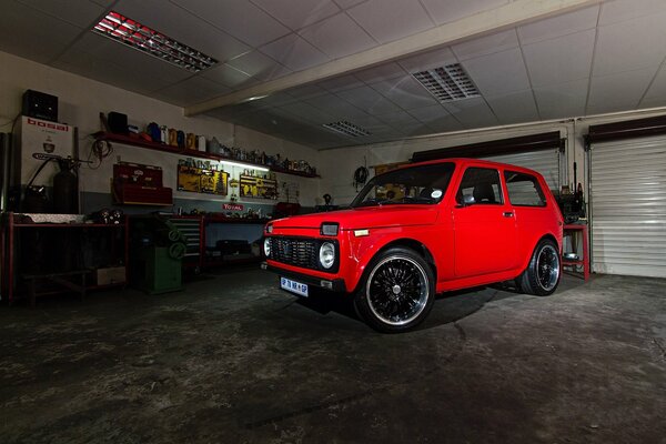 Lada low red car