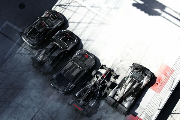 Black codemasters sports cars stand in a row