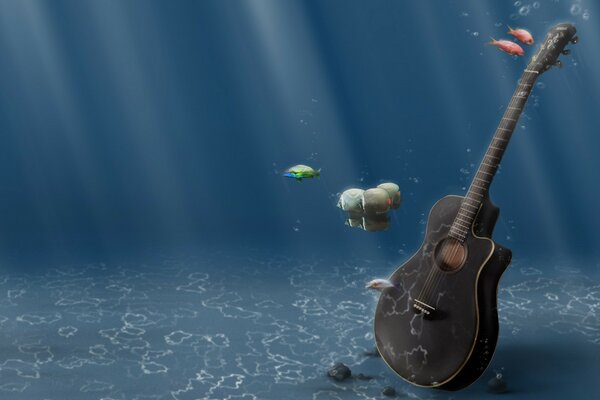 Black acoustic guitar on the ocean floor