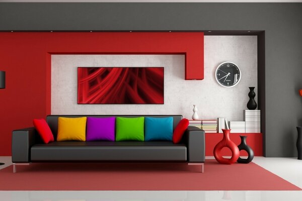 Large black sofa in the room with red accents