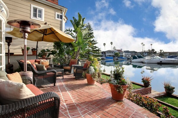 Modern terrace with a bid to the lake and yachts