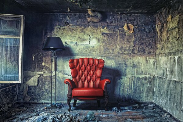 There is a red chair and an open window in the room