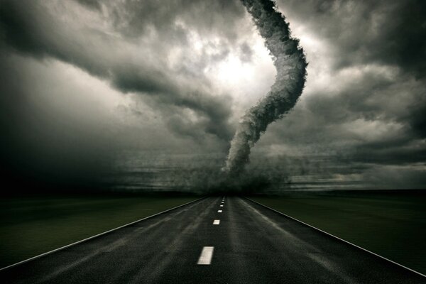 A terrifying tornado on the road in dark color