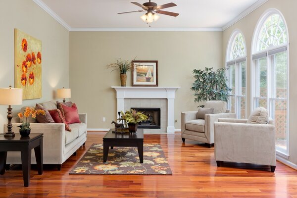 Living room with fireplace and high ceilings