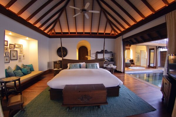 Background of the bedroom of a villa with a swimming pool