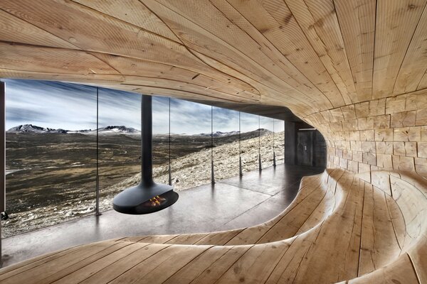 Recreation room with stained glass window with mountain view