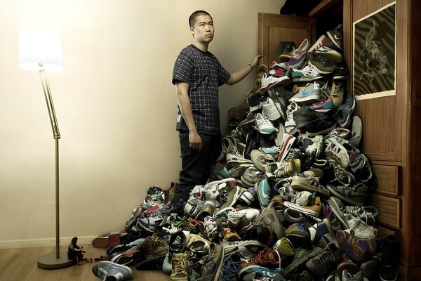 Dude stuck in a pile of sneakers