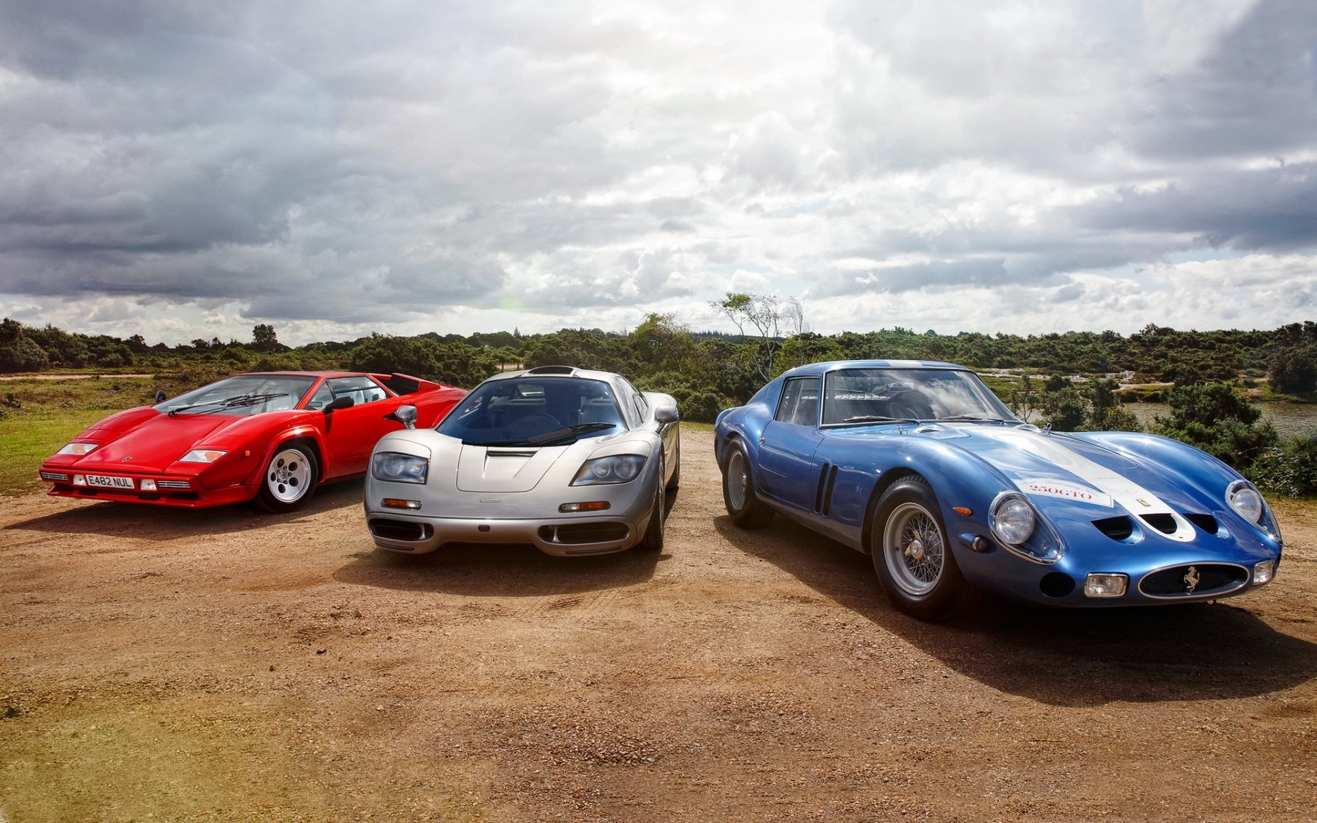 lamborghini countach lp5000 s quattrovalvole 1985 and mclaren f1 1993 ferrari gto 1962 lamborghini mclaren ferrari front end sky