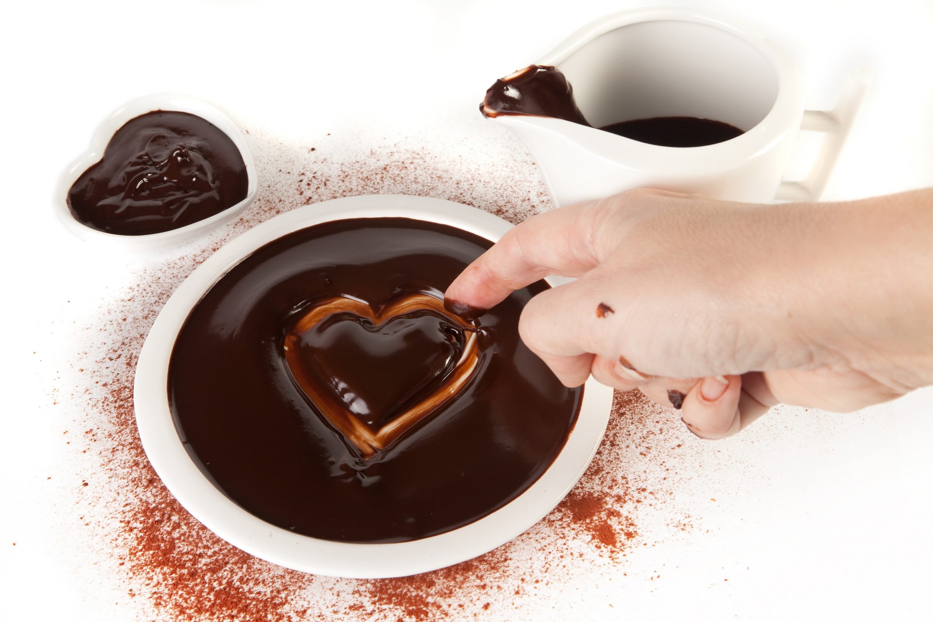 chocolate heart hand thumb white background plate