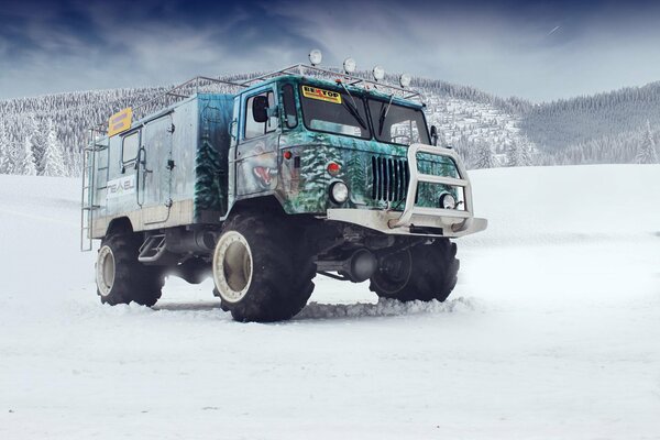 Tuned gaz 66 driving on a snowy road