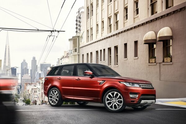 Red SUV on city roads