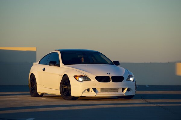 A white car at sunset