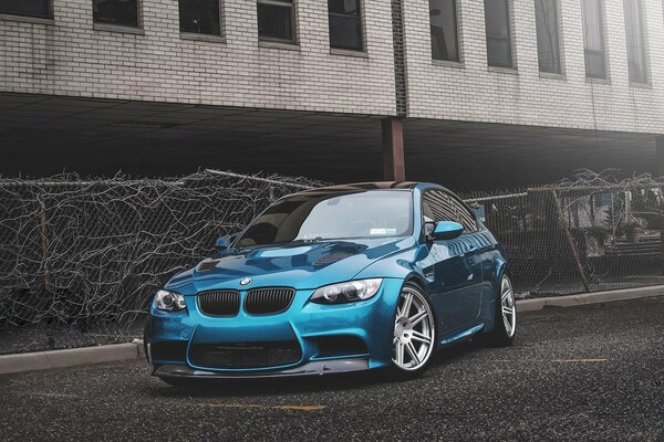 Blue BMW on silver wheels