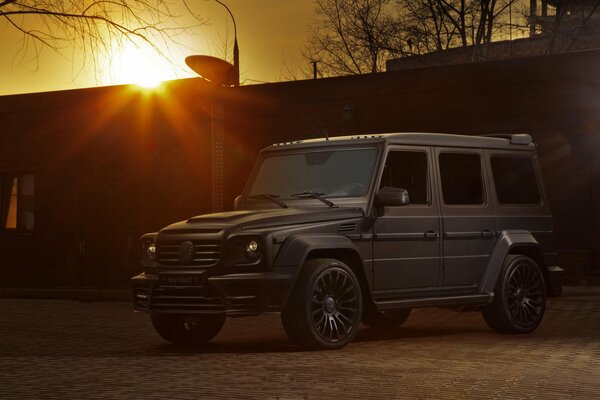 Mercedes in an urban environment at sunset