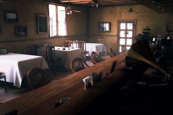 Barra de Bar y mesas en manteles en la cafetería